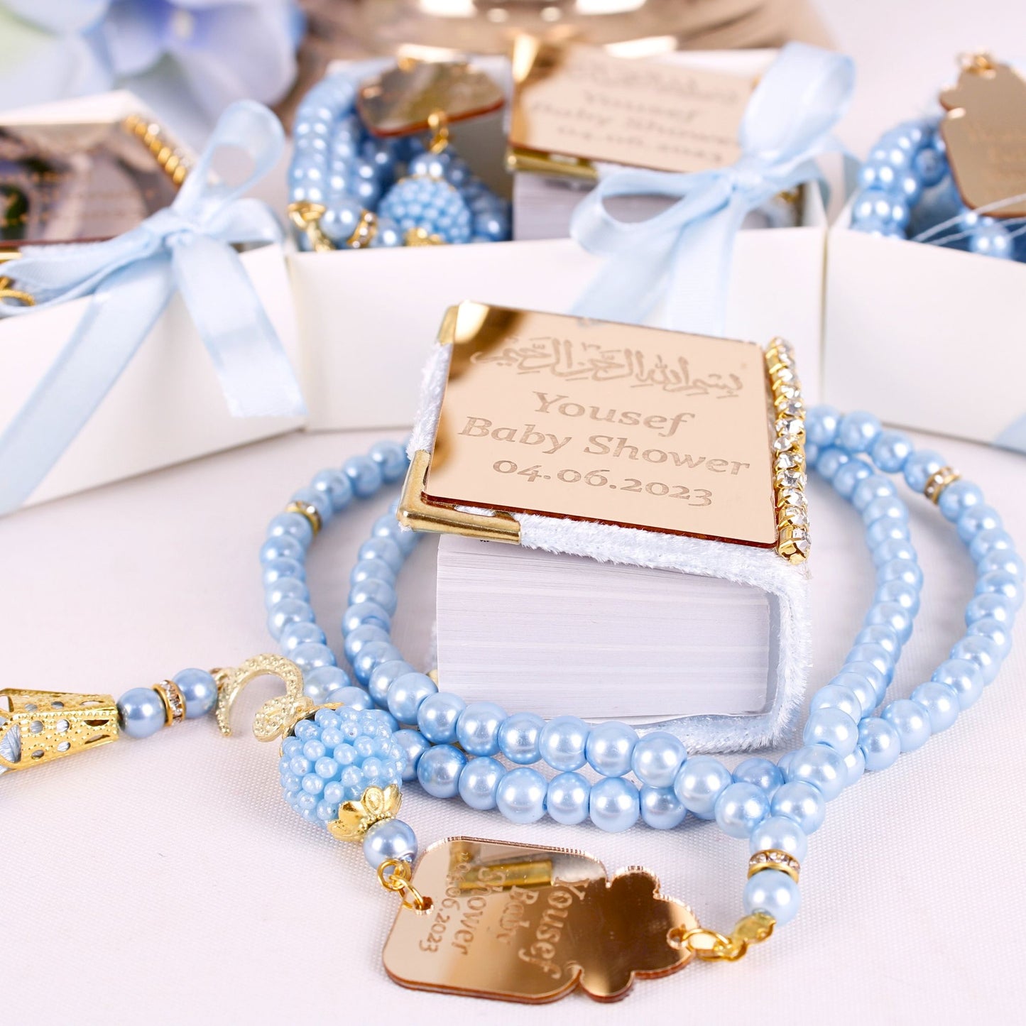 Personalized Mini Quran Pearl Prayer Beads Baby Shower Favor for Boys - Islamic Elite Favors is a handmade gift shop offering a wide variety of unique and personalized gifts for all occasions. Whether you're looking for the perfect Ramadan, Eid, Hajj, wedding gift or something special for a birthday, baby shower or anniversary, we have something for everyone. High quality, made with love.