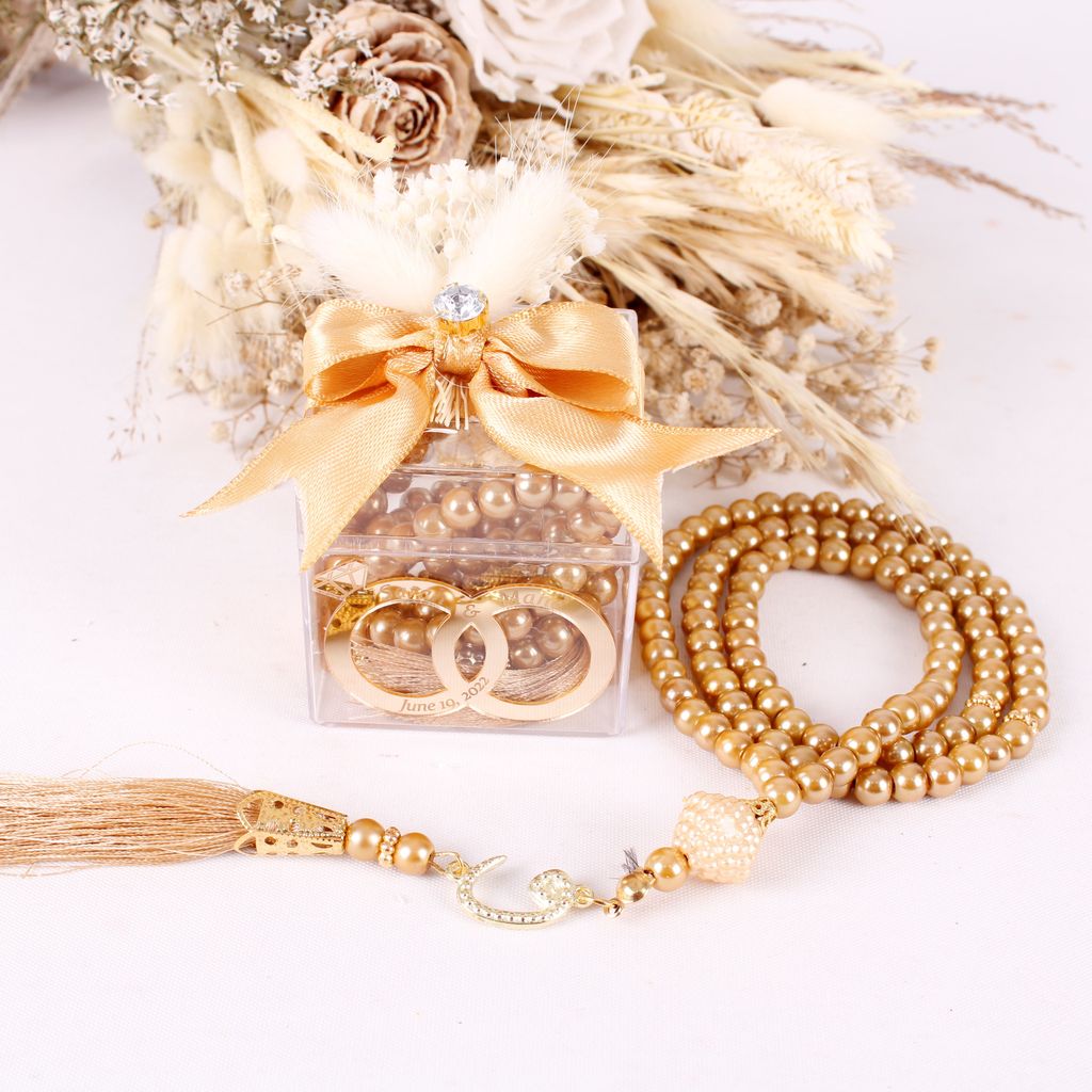 Personalized Prayer Beads Wedding Favor Gift Box with Wedding Rings - Islamic Elite Favors is a handmade gift shop offering a wide variety of unique and personalized gifts for all occasions. Whether you're looking for the perfect Ramadan, Eid, Hajj, wedding gift or something special for a birthday, baby shower or anniversary, we have something for everyone. High quality, made with love.